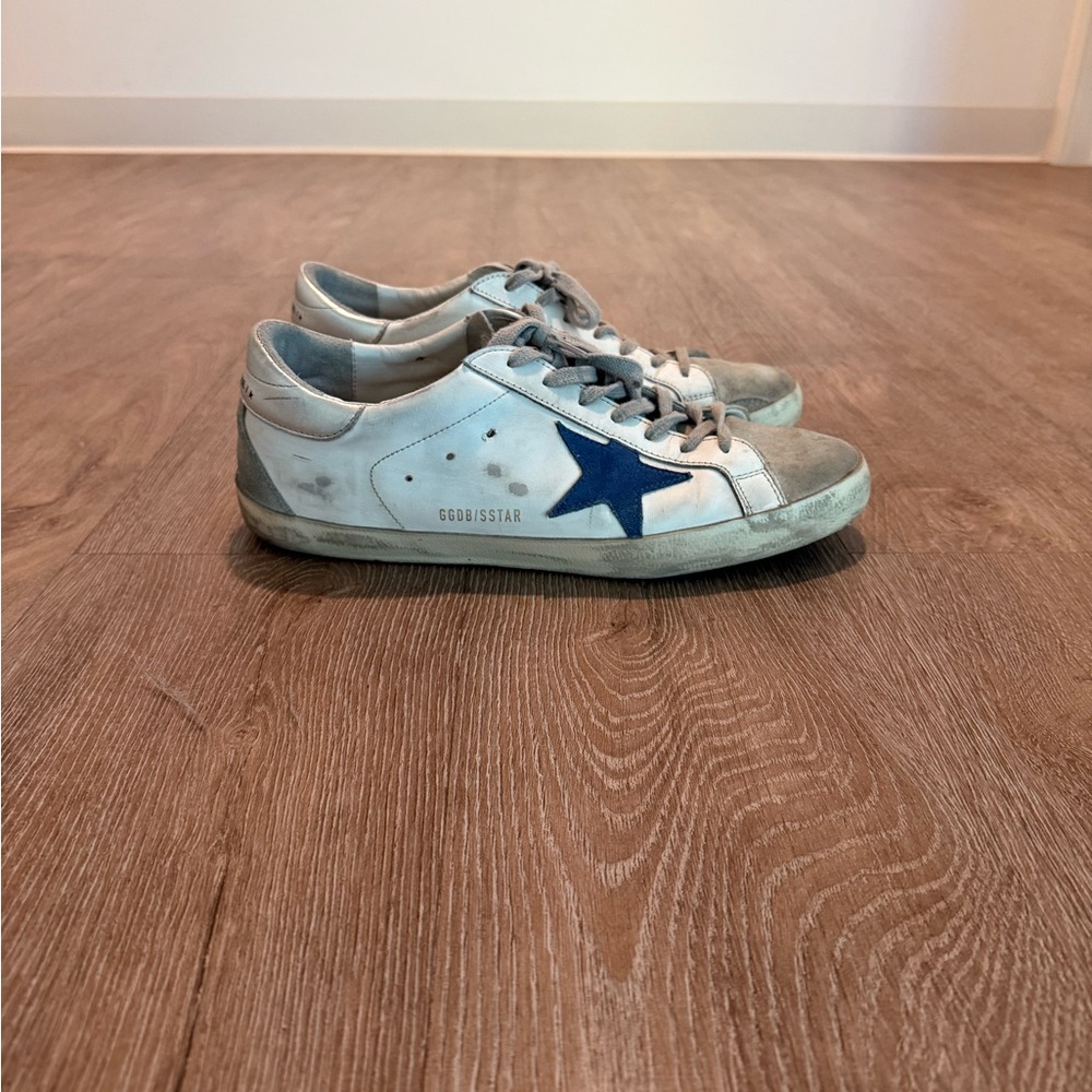 Golden Goose Super Star Sneaker. Leather upper, suede star and heel. Silver tab